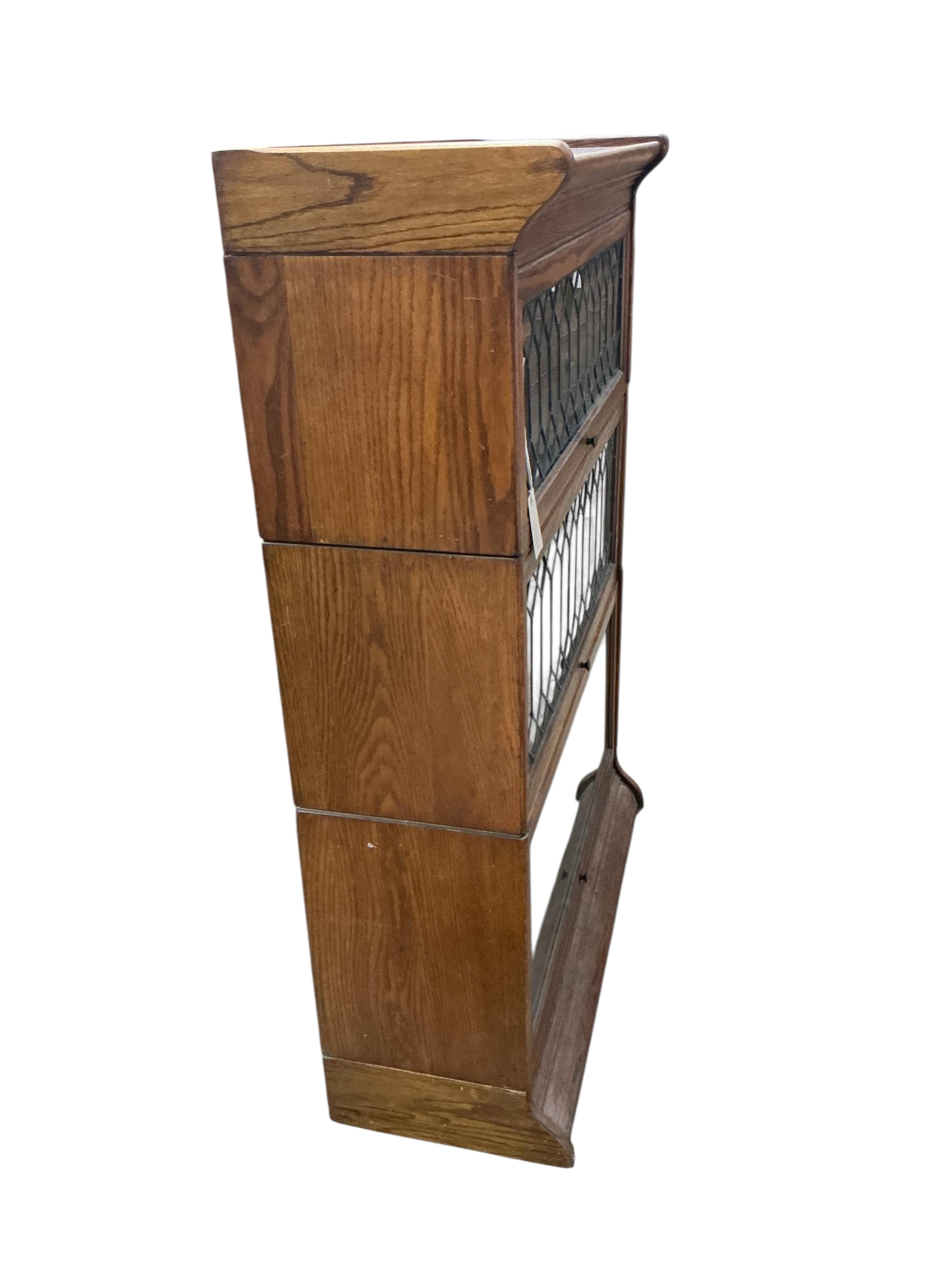 A Globe Wernicke style three section bookcase, width 86cm, depth 34cm, height 123cm